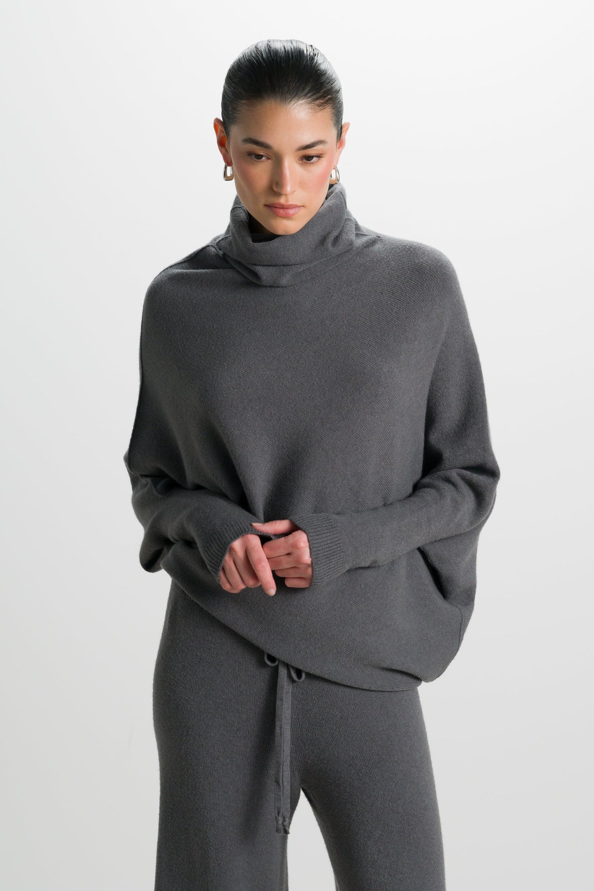 Asymmetric Draped Roll Neck | Charcoal | Seamless Knit