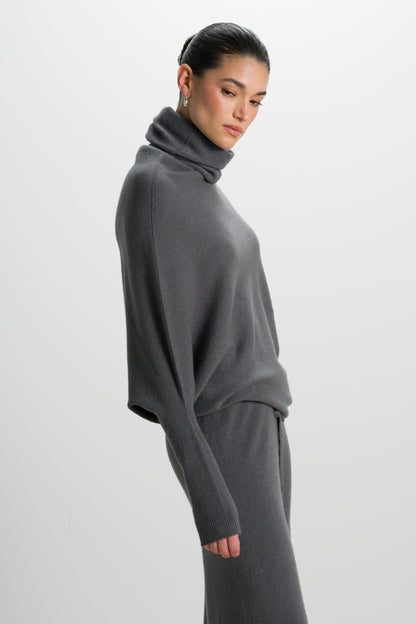 Asymmetric Draped Roll Neck | Charcoal | Seamless Knit