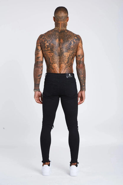 SKINNY FIT JEANS DESTROYED KNEE - BLACK