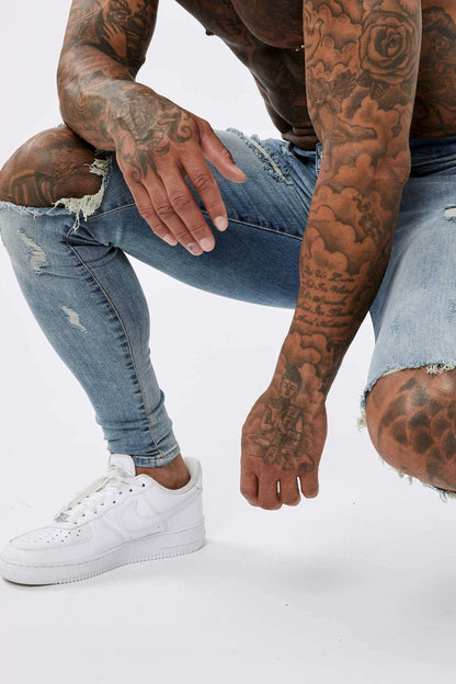 SKINNY FIT JEANS RIPPED & REPAIRED - STRONG WASHED DARK BLUE
