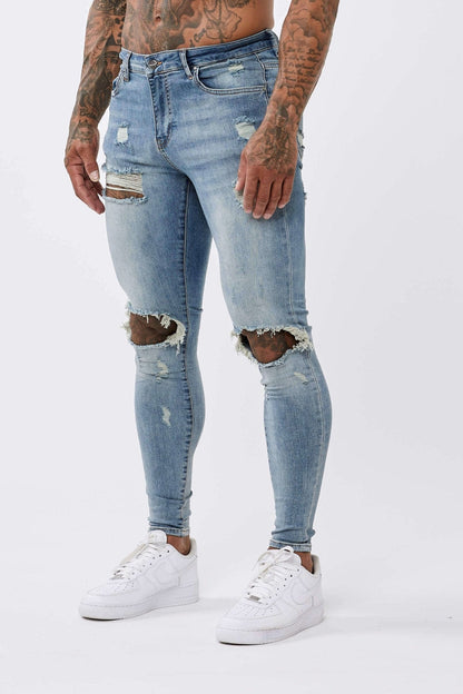 SKINNY FIT JEANS RIPPED & REPAIRED - STRONG WASHED DARK BLUE